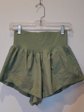 FP Movement by Free People "Carpe Diem" Ribbed Waist Flared shorts in color Fern